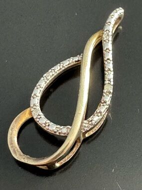 Sterling Silver Two Tone Treble Clef Pendant Pave CZ Infinity Style